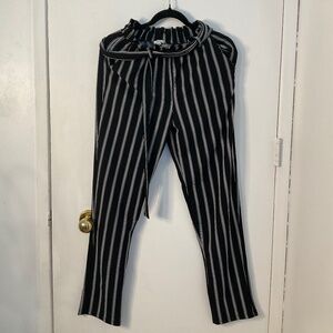 Black and white stripped ruffle hem tie pants